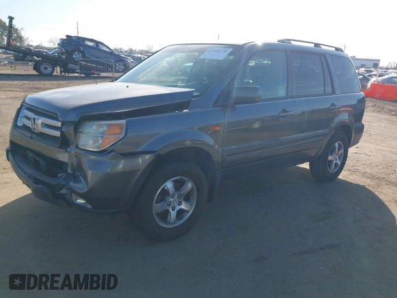 2007 Honda Pilot EX-L with VIN 5FNYF28797B001772, listed as a IAAI auction lot 41320270 with 220,227 mi miles. Bid and sale history available at carsss.com. Image 2.
