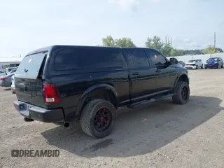 2015 Ram 2500 Laramie with VIN 3C6UR5FL0FG655552, listed as a IAAI auction lot 42456897 with 143,885 mi miles and . Bid and sale history available at DreamBid. Image 4.