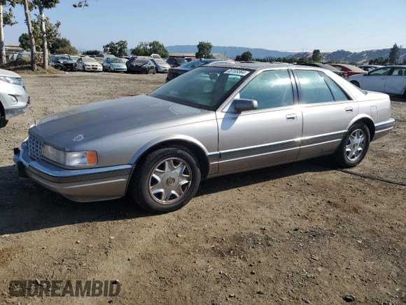 1997 Cadillac Seville Luxury SLS with VIN 1G6KS52Y0VU801906, listed as a Copart auction lot 65169364 with 191,627 mi miles and Salvage Title. Bid and sale history available at carsss.com. Image 1.