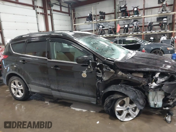 2013 Ford Escape SE with VIN 1FMCU9GX6DUC07446, listed as a IAAI auction lot 41089866 with 119,018 mi miles. Bid and sale history available at carsss.com. Image 13.