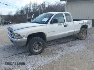 1997 Dodge Dakota with VIN 1B7GG23X0VS136400, listed as a IAAI auction lot 41642514 with 223,696 mi miles. Bid and sale history available at carsss.com. Image 2.