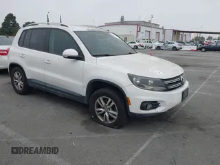 2014 Volkswagen Tiguan SE z VIN WVGAV3AX7EW507156, wystawiony jako IAAI lot #42482514 z przebiegiem 181 897 mil mil oraz . Historia ofert i sprzedaży dostępna na DreamBid. Obrazek 1.