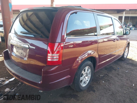2008 Chrysler Town & Country Touring with VIN 2A8HR54P48R786571, listed as a IAAI auction lot 41871738 with 142,235 mi miles. Bid and sale history available at carsss.com. Image 4.