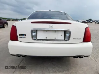 2004 Cadillac DeVille z VIN 1G6KD54Y04U111840, wystawiony jako Copart lot #56712195 z przebiegiem 60 378 mil mil oraz Szkody całkowita. Historia ofert i sprzedaży dostępna na DreamBid. Obrazek 6.