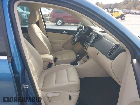 2017 Volkswagen Tiguan Wolfsburg Edition with VIN WVGRV7AX6HW504313, listed as a IAAI auction lot 40950812 with 149,884 mi miles and . Bid and sale history available at DreamBid. Image 5.