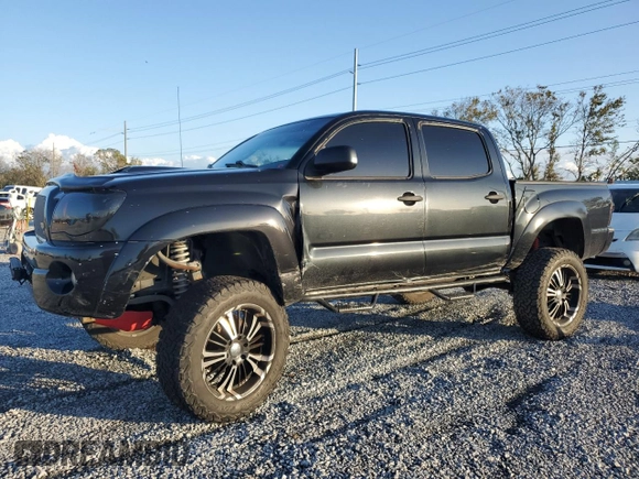 2009 Toyota Tacoma PreRunner with VIN 3TMJU62N19M086594, listed as a Copart auction lot 87074924 with 211,200 mi miles and Salvage Title. Bid and sale history available at carsss.com. Image 1.