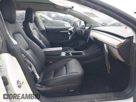 2023 Tesla Model 3 Performance z VIN 5YJ3E1EC8PF487550, wystawiony jako IAAI lot #42093712 z przebiegiem 27 305 mil mil oraz . Historia ofert i sprzedaży dostępna na DreamBid. Obrazek 5.