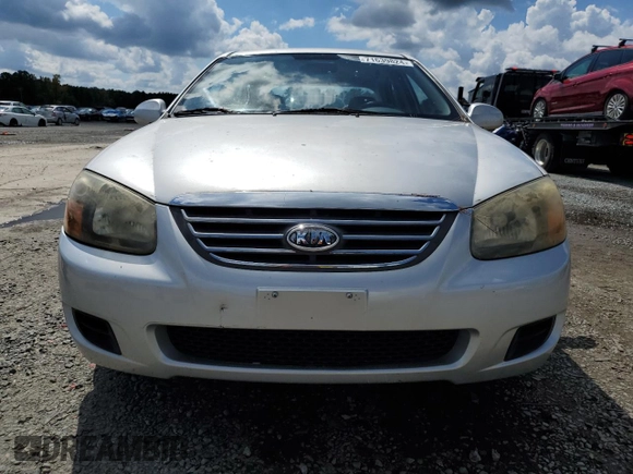 2009 Kia Spectra EX with VIN KNAFE221395597123, listed as a Copart auction lot 71639824 with 83,203 mi miles and Salvage Title. Bid and sale history available at carsss.com. Image 5.