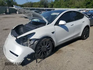 2024 Tesla Model Y Performance with VIN 7SAYGDEF4RF064210, listed as a Copart auction lot 52498805 with 14,318 mi miles and Non Repairable. Bid and sale history available at DreamBid. Image 1.