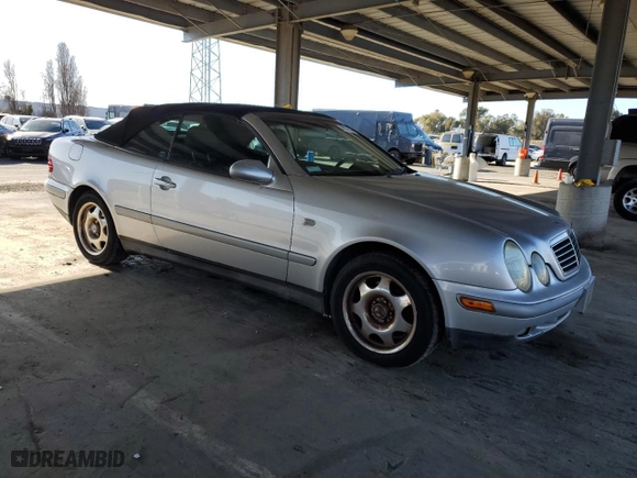 1999 Mercedes-Benz CLK-Class with VIN WDBLK65G5XT006724, listed as a Copart auction lot 48077565 with 151,463 mi miles and Salvage Title. Bid and sale history available at carsss.com. Image 4.