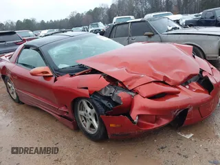 2001 Pontiac Firebird with VIN 2G2FS22K612112434, listed as a IAAI auction lot 41554867 with 208,699 mi miles. Bid and sale history available at carsss.com. Image 1.