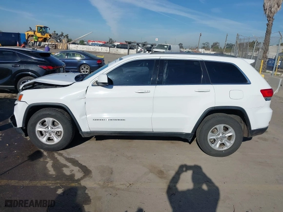 2014 Jeep Grand Cherokee Laredo with VIN 1C4RJEAGXEC130399, listed as a IAAI auction lot 41861664 with 106,925 mi miles. Bid and sale history available at carsss.com. Image 14.