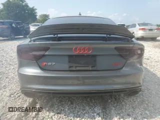 2014 Audi RS 7 Prestige z VIN WUAW2AFC0EN904083, wystawiony jako Copart lot #63479854 z przebiegiem 80 093 mil mil oraz Szkody całkowita. Historia ofert i sprzedaży dostępna na DreamBid. Obrazek 6.