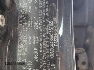 2010 Kia Optima LX z VIN KNAGG4A86A5451165, wystawiony jako Copart lot #52763415 z przebiegiem 213 958 mil mil oraz Szkoda całkowita • Salvage title. Historia ofert i sprzedaży dostępna na DreamBid. Obrazek 12.