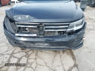 2021 Volkswagen Tiguan SE with VIN 3VV2B7AXXMM057849, listed as a IAAI auction lot 41879768 with 88,353 mi miles and . Bid and sale history available at DreamBid. Image 6.