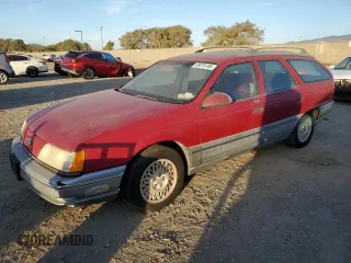 1990 Ford Taurus with VIN 1FACP5840LG228286, listed as a Copart auction lot 58259035 with 47,332 mi miles and Clean title. Bid and sale history available at DreamBid. Image 1.