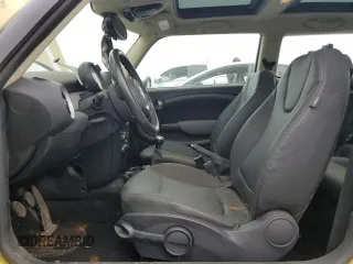 2011 MINI Hardtop with VIN WMWSU3C58BTX96968, listed as a Copart auction lot 62560915 with 88,616 mi miles and Salvage title. Bid and sale history available at DreamBid. Image 7.