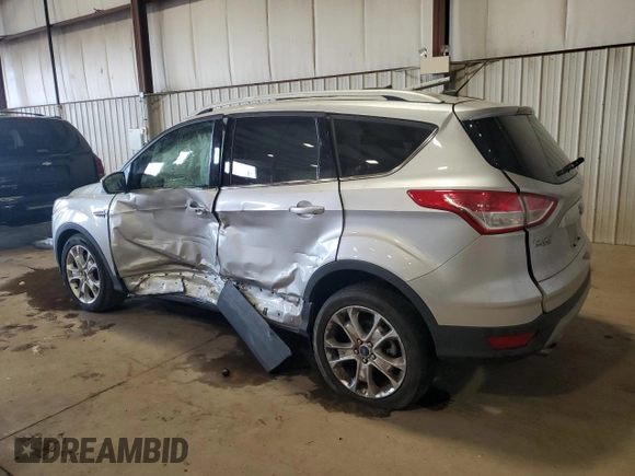 2016 Ford Escape Titanium with VIN 1FMCU9J9XGUC49553, listed as a Copart auction lot 54850245 with Not Provided miles and Salvage Title. Bid and sale history available at DreamBid. Image 2.