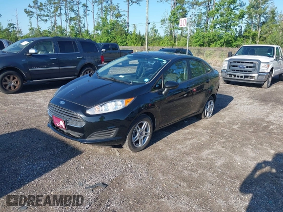 2019 Ford Fiesta SE z VIN 3FADP4BJ2KM159022, wystawiony jako IAAI lot #42269813 z przebiegiem 55 107 mil mil oraz . Historia ofert i sprzedaży dostępna na DreamBid. Obrazek 2.
