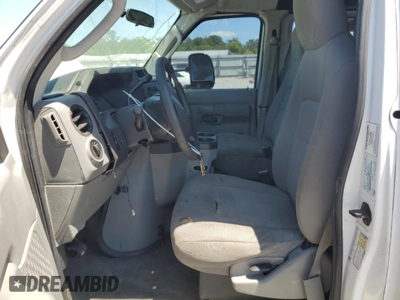 2009 Ford Econoline Cargo Commercial with VIN 1FTNE14W99DA93361, listed as a Copart auction lot 61009574 with 299,496 mi miles and Salvage Title. Bid and sale history available at DreamBid. Image 7.