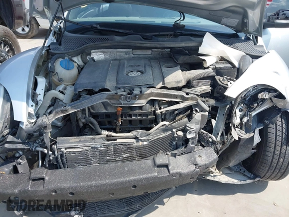 2013 Volkswagen Beetle 2.5L with VIN 3VWJX7AT7DM673319, listed as a IAAI auction lot 42169554 with 128,622 mi miles and . Bid and sale history available at DreamBid. Image 10.
