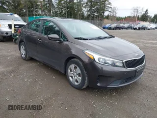 2017 Kia Forte LX with VIN 3KPFK4A74HE018334, listed as a IAAI auction lot 41867916 with 91,671 mi miles. Bid and sale history available at carsss.com. Image 1.