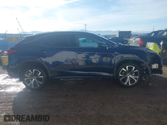2022 Lexus RX 350 with VIN 2T2HZMDA9NC344583, listed as a IAAI auction lot 41878741 with 27,946 mi miles and . Bid and sale history available at DreamBid. Image 13.