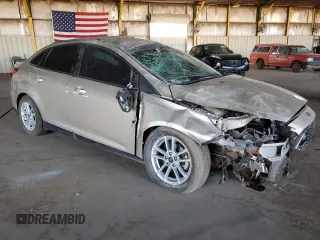 2017 Ford Focus SE with VIN 1FADP3F27HL303378, listed as a Copart auction lot 51862925 with 98,464 mi miles and Salvage Title. Bid and sale history available at DreamBid. Image 4.