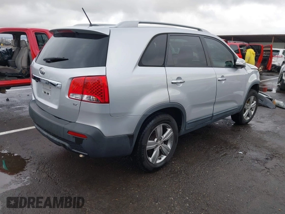 2012 Kia Sorento EX with VIN 5XYKU3A67CG256345, listed as a IAAI auction lot 41777490 with Not Provided miles and . Bid and sale history available at carsss.com. Image 4.