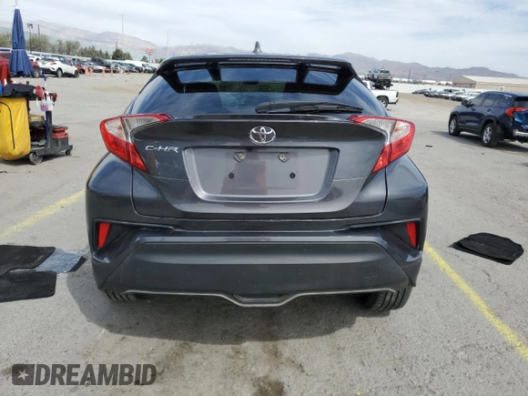 2019 Toyota C-HR XLE z VIN NMTKHMBX2KR096795, wystawiony jako Copart lot #51121655 z przebiegiem 39 679 mil mil oraz Nie do naprawy • Non repairable. Historia ofert i sprzedaży dostępna na DreamBid. Obrazek 6.