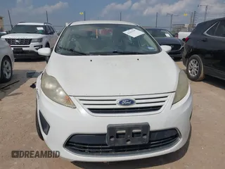 2011 Ford Fiesta S with VIN 3FADP4AJ1BM142682, listed as a IAAI auction lot 42162397 with 214,403 mi miles and . Bid and sale history available at DreamBid. Image 12.