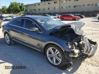 2015 Volkswagen CC R-Line with VIN WVWBN7AN0FE824699, listed as a Copart auction lot 77967484 with 73,800 mi miles and Salvage Title. Bid and sale history available at carsss.com. Image 4.