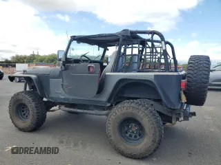 1990 Jeep Wrangler with VIN 2J4FY29T5LJ537896, listed as a Copart auction lot 57021295 with 143,753 mi miles and Clean title. Bid and sale history available at DreamBid. Image 2.