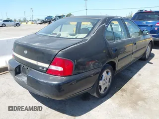 2001 Nissan Altima GXE with VIN 1N4DL01A21C216440, listed as a IAAI auction lot 41999928 with 169,289 mi miles. Bid and sale history available at carsss.com. Image 4.