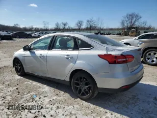 2016 Ford Focus SE with VIN 1FADP3F26GL332241, listed as a Copart auction lot 41868995 with 162,401 mi miles and Salvage Title. Bid and sale history available at DreamBid. Image 2.