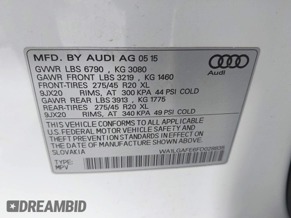 2015 Audi Q7 Premium Plus z VIN WA1LGAFE6FD028835, wystawiony jako IAAI lot #42358725 z przebiegiem 107 075 mil mil oraz . Historia ofert i sprzedaży dostępna na DreamBid. Obrazek 9.