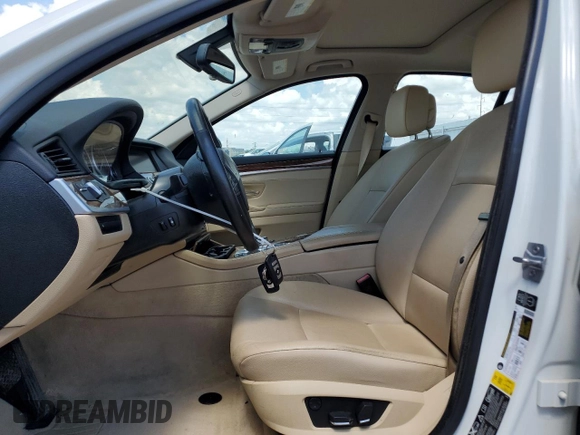 2013 BMW 5 Series 528i xDrive with VIN WBAXH5C59DD114263, listed as a Copart auction lot 56780425 with 128,317 mi miles and Clean title. Bid and sale history available at DreamBid. Image 7.