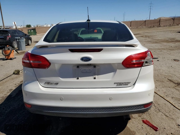 2015 Ford Focus Titanium with VIN 1FADP3J23FL300126, listed as a Copart auction lot 54434165 with 176,526 mi miles and Salvage title. Bid and sale history available at DreamBid. Image 6.