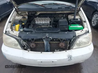 2004 Kia Sedona LX with VIN KNDUP131446537660, listed as a IAAI auction lot 41526183 with 282,891 mi miles. Bid and sale history available at carsss.com. Image 10.