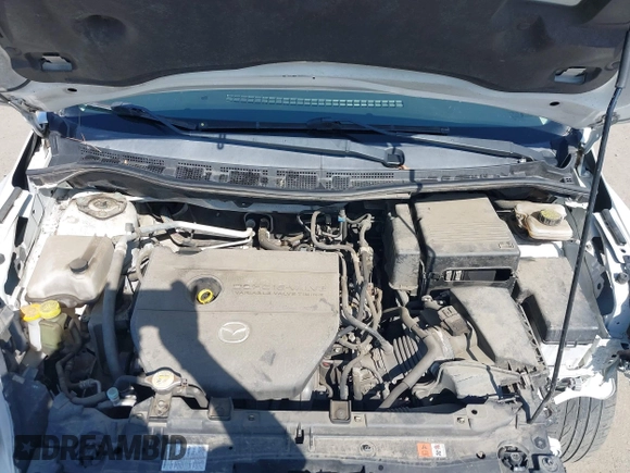 2012 Mazda 5 Touring with VIN JM1CW2CL7C0140452, listed as a IAAI auction lot 41970209 with 92,069 mi miles and . Bid and sale history available at DreamBid. Image 10.