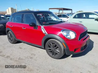 2013 MINI Countryman S with VIN WMWZC3C52DWP21573, listed as a IAAI auction lot 42255227 with 115,531 mi miles and . Bid and sale history available at DreamBid. Image 1.