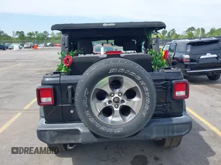 2018 Jeep Wrangler Sport S with VIN 1C4GJXAN8JW290064, listed as a IAAI auction lot 42012484 with 93,838 mi miles and . Bid and sale history available at DreamBid. Image 16.