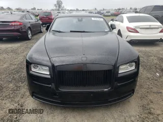 2014 Rolls-Royce Wraith z VIN SCA665C5XEUX84336, wystawiony jako Copart lot #73181343 z przebiegiem 34 367 mil mil oraz Szkody całkowita. Historia ofert i sprzedaży dostępna na DreamBid. Obrazek 5.