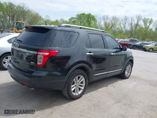 2014 Ford Explorer XLT with VIN 1FM5K8D85EGC27757, listed as a IAAI auction lot 41997381 with 154,397 mi miles. Bid and sale history available at carsss.com. Image 4.