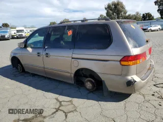 2003 Honda Odyssey EX-L z VIN 5FNRL18043B154662, wystawiony jako Copart lot #52896015 z przebiegiem 216 099 mil mil oraz Szkoda całkowita • Salvage title. Historia ofert i sprzedaży dostępna na DreamBid. Obrazek 2.
