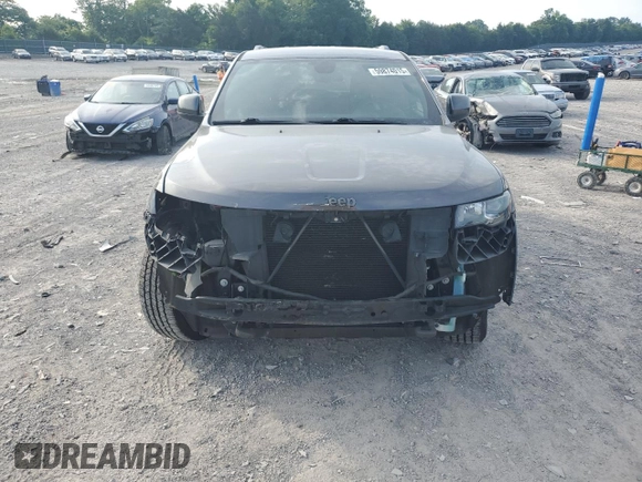 2016 Jeep Grand Cherokee 75th Anniversary with VIN 1C4RJEAG1GC506443, listed as a Copart auction lot 59874015 with 135,714 mi miles and Salvage title. Bid and sale history available at DreamBid. Image 5.