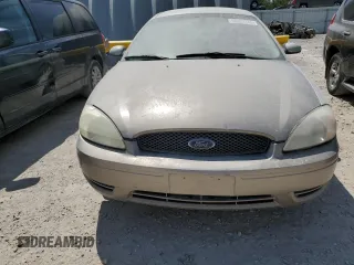 2007 Ford Taurus SEL with VIN 1FAFP56U97A177718, listed as a Copart auction lot 58003135 with 122,079 mi miles and Salvage title. Bid and sale history available at DreamBid. Image 5.