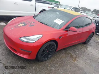 2018 Tesla Model 3 Long Range Battery z VIN 5YJ3E1EB7JF135199, wystawiony jako IAAI lot #41580853 z przebiegiem 131 774 mil mil oraz . Historia ofert i sprzedaży dostępna na DreamBid. Obrazek 2.