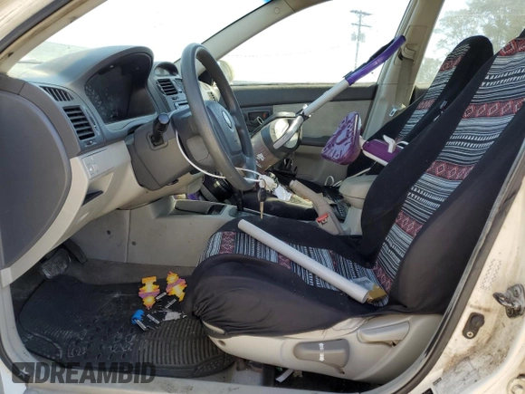 2005 Kia Spectra LX with VIN KNAFE121055167652, listed as a Copart auction lot 72753994 with Not Provided miles and Salvage Title. Bid and sale history available at carsss.com. Image 7.