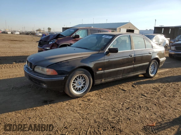 1999 BMW 5 Series 528iA with VIN WBADM634XXGU02243, listed as a Copart auction lot 74981184 with 234,566 mi miles and Salvage Title. Bid and sale history available at carsss.com. Image 1.